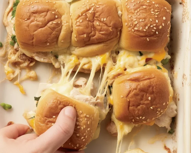 Delicious chicken sliders recipe with shredded chicken, cheese, and Hawaiian rolls.