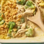 Delicious chicken divan casserole with broccoli, creamy sauce, and melted cheese.